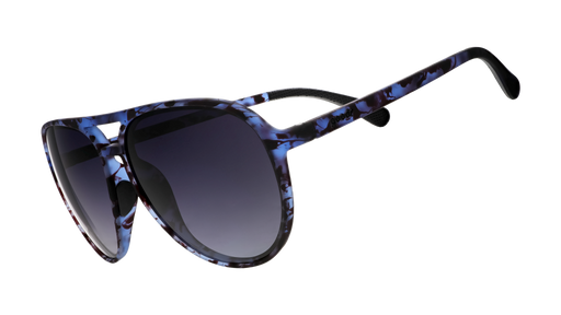 Three-quarter angle view of translucent blue tortoiseshell aviator frames featuring black gradient lenses.