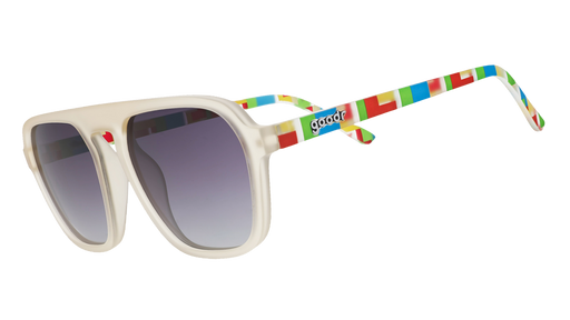 Light gray sunglasses with purple gradient lenses and colorful geometric temple patterns on blue.