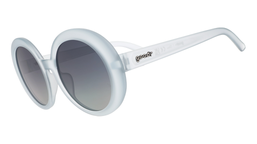 Three-quarter angle view of oversized round sunglasses with translucent blue frames and silver reflective gradient lenses.