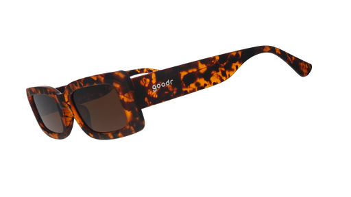 Three-quarter angle view of tortoiseshell rectangular sunglasses with brown polarized lenses against a white background.