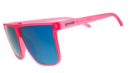 Three-quarter view of pink wide-fit, oversized flat-top sunglasses with blue reflective lenses.