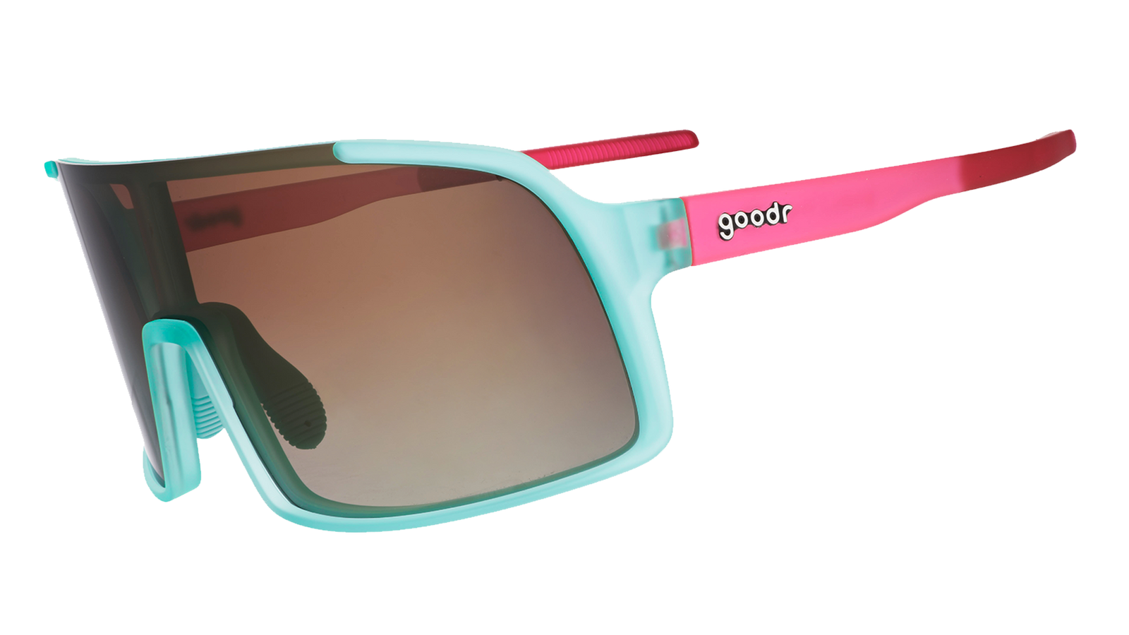 Three-quarter angle view of teal wrap sunglasses with pink arms and amber gradient lenses.