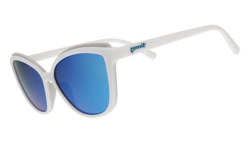 White cat-eye sunglasses with light blue mirrored lenses on a blue patterned background.