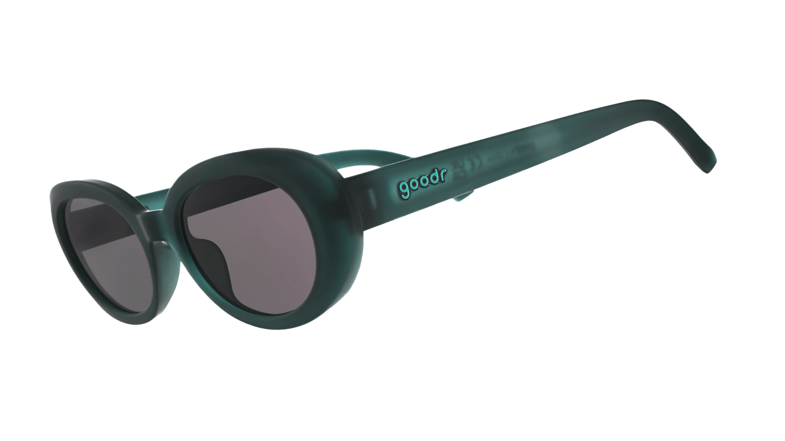 Three-quarter-angle view of translucent dark green Beat G sunglasses with black non-reflective lenses. 