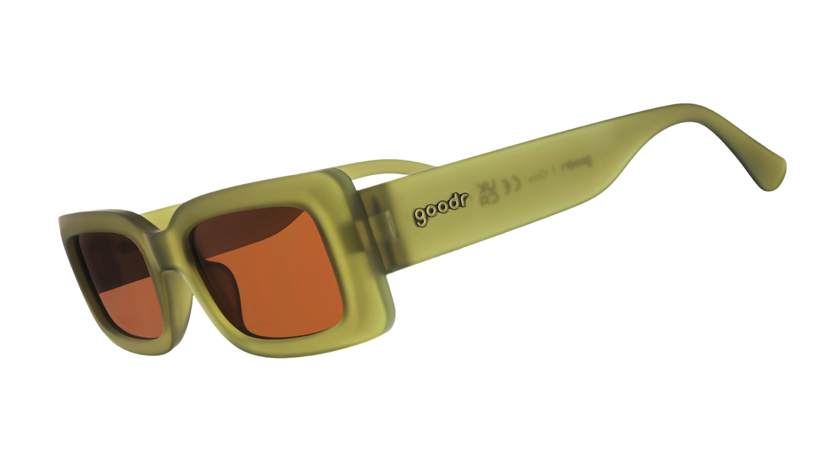Three-quarter-angle view of rectangular Luxe G sunglasses in translucent olive green with brown non-reflective lenses.