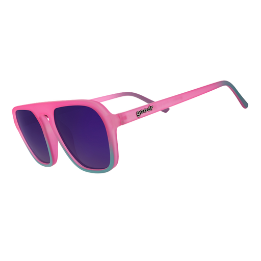 Three-quarter angle view of pink and teal aviator sunglasses with reflective lenses against a white backdrop.